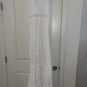 white halter top flowy maxi dress open back